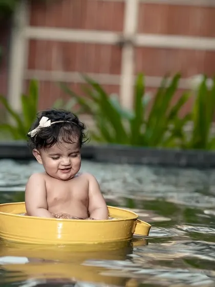 A quiet moment of enjoyment in the water. The reflection in the pond adds a beautiful, serene quality to this photo.