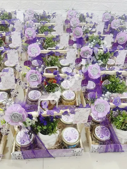 A large order of our lavender theme birthday hampers for Kaira's first birthday. Each hamper contains a mix of healthy and tasty treats, along with a beautiful ceramic Buddha planter.