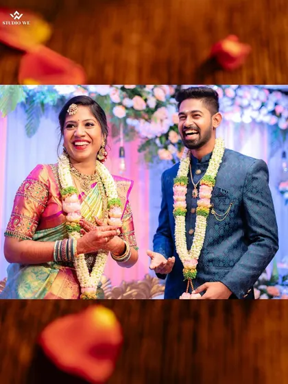 Pure, unscripted laughter during the engagement ceremony. These are the candid moments we cherish, capturing the genuine happiness shared between the couple and their families.