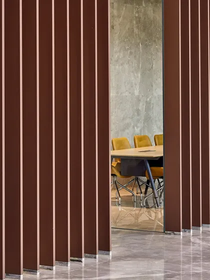 At Sumadhura Capitol Towers in Bengaluru, I used vertical fins to create a sense of rhythm and privacy for a meeting room. The design focuses on open, column-free floor plates that are adaptable to the evolving needs of its users.