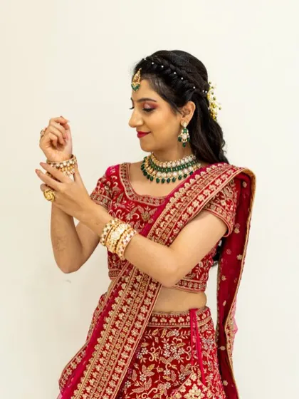 The bride's beautiful smile and sparkling eyes are the highlight of this reception look.