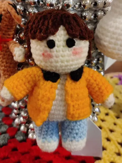 A close-up of my handmade Jungkook doll, capturing his signature style.