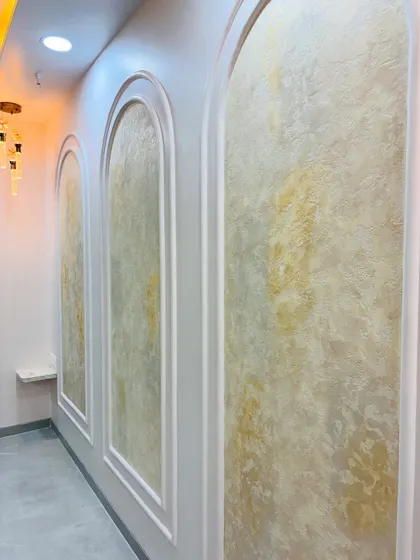 A final look at the elegant arched wall panels, which add a touch of classic European design to the space.