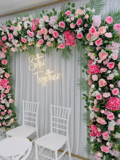 Our "Better Together" neon sign is a popular rental item for engagements, weddings, and anniversaries. It looks fantastic as a photo backdrop, especially when paired with a lush floral arch.