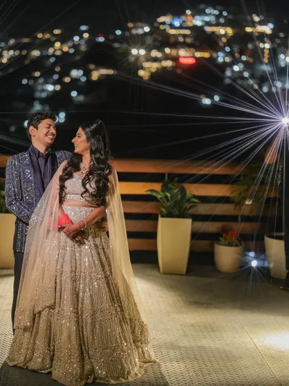 A destination wedding is about more than just a location; it's about a feeling. Here, against the sparkling city lights of the hills, I captured a quiet moment of togetherness that feels as vast and beautiful as the view.