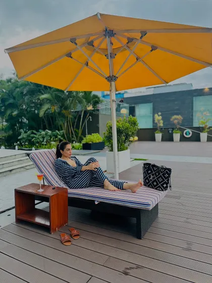 Relaxing by the pool in my striped co-ord. This is what staycation goals are made of.