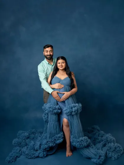 A beautiful couple's portrait from the blue-themed shoot. Their connection is the centerpiece of this magical setting.