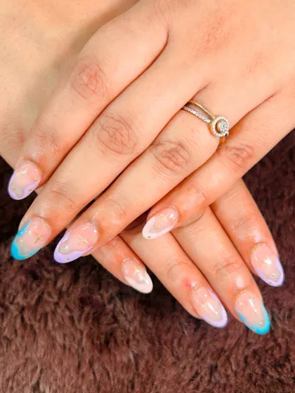 A dreamy, abstract design with pastel blue and purple watercolor-style tips.
