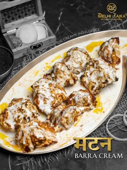 This is my Mutton Barra Cream, a dish of pure indulgence. The smoky, tandoor-grilled mutton pieces are generously coated in a thick, white cream sauce. The black and white presentation of this photo highlights the texture and richness of this creamy delight.
