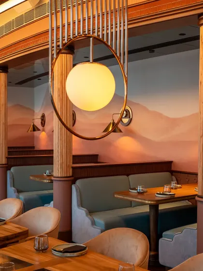 Our booths are designed for comfort and conversation. The soft, curved seating and warm, ambient lighting create a cozy and intimate setting for your meal.