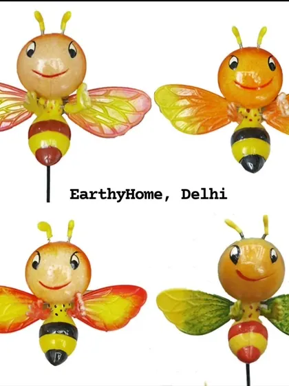 Brighten up your garden with these cheerful honeybee sticks. Their smiling faces and colorful wings are sure to make you happy.