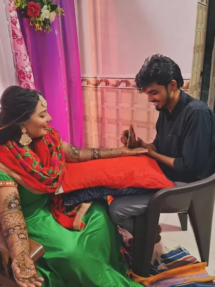 A happy client enjoying her mehandi session. Customer satisfaction is my top priority.