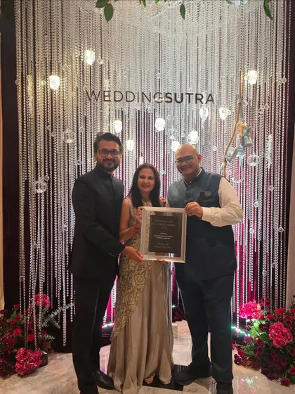 Receiving our Platinum award at the WeddingSutra Influencer Awards. A proud moment for the entire Popular Hospitality team.
