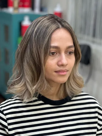 A portrait of the client, her blonde hair perfectly complementing her features.