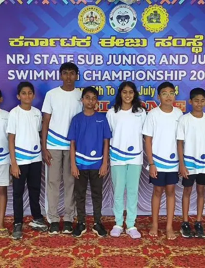 Our sub-junior and junior team standing together at the State Aquatic Championship. We build a strong team foundation from a young age.