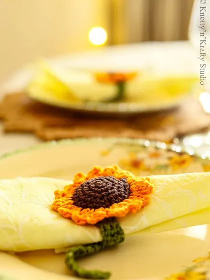 A beautiful close-up of the sunflower napkin tie, showing its texture and detail.