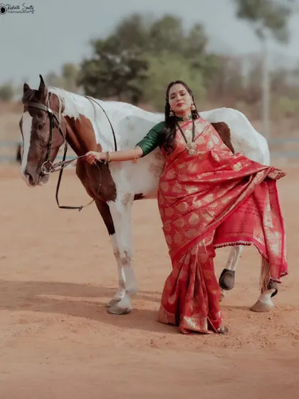 A duplicate of image 54, showcasing the flowing movement of the saree.