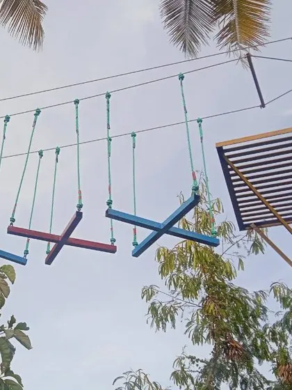 For those who love a challenge, our high rope adventure course is waiting. This is just one of the many elements designed to test your balance and courage, perfect for a team outing or a fun day with friends.