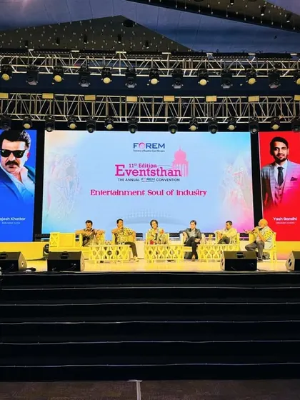 A wide shot of the impressive stage setup for our panel discussion at the FOREM Convention.