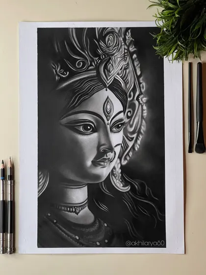 A handmade charcoal drawing of Maa Durga. This is an identical piece to another in my collection, showing my ability to recreate powerful spiritual art for multiple clients.