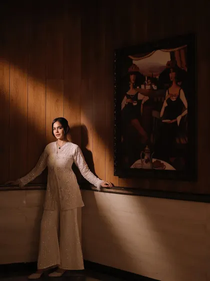 Another artistic shot with dramatic lighting, showing my ability to create high-fashion looks.
