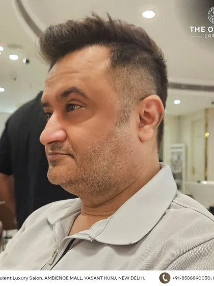 Another angle of this sharp and stylish men's haircut, perfect for the modern gentleman.