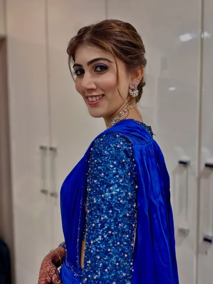 She asked for 'natural but make it pop', and that's exactly what we did. A fresh, glowing look for her Sangeet.