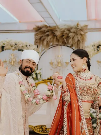 A playful, happy moment between the bride and groom. It’s these unposed interactions that reveal the true connection and friendship within a love story.
