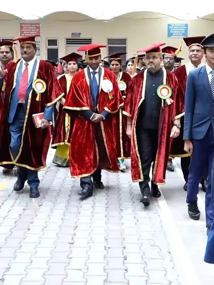 The ceremonial procession entering the auditorium, led by the college band. A grand start to a momentous day.