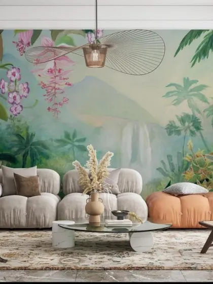 A dreamy, painterly jungle scene complete with a waterfall and soft florals. This mural creates a magical and tranquil escape, perfect for a creative space or a serene waiting area.