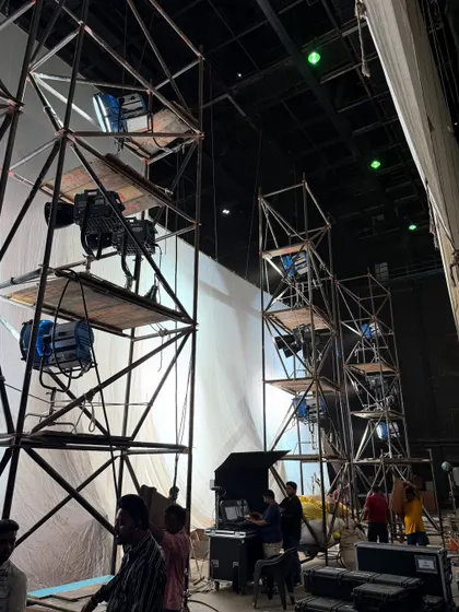 Behind-the-scenes of a Big Boss promo shoot. This image shows the scaffolding and rigging used to position our powerful Nanlux 5000B and ARRI M90 lights for optimal coverage.
