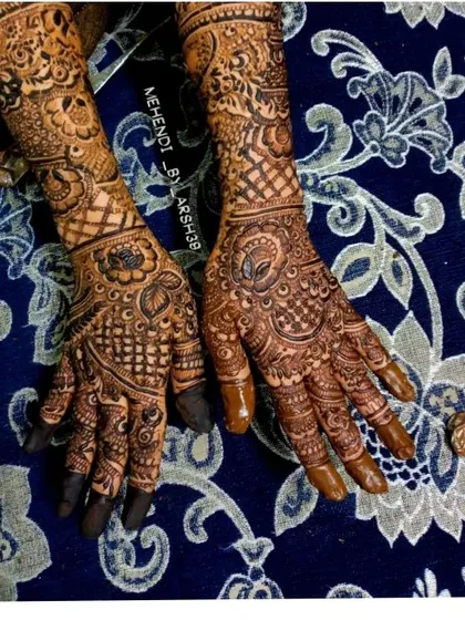 Another view of the same intricate henna pattern.