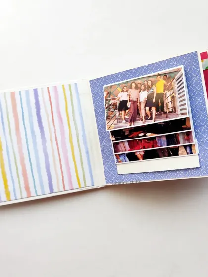 A page from a mini farewell scrapbook for a colleague, featuring a waterfall photo display.