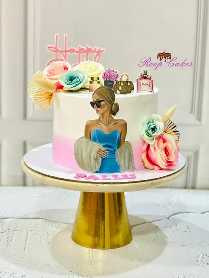 A chic and fashionable cake for a stylish birthday girl, featuring an edible illustration and miniature designer accessories.