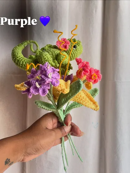 Adding a purple flower to the growing Rapunzel bouquet, building up the layers of color.
