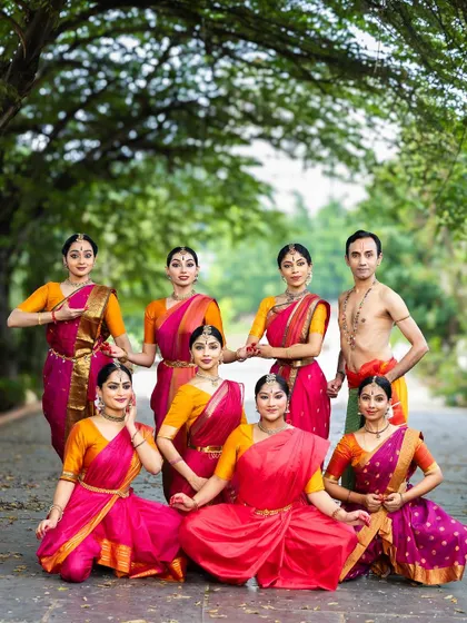 The full ensemble for "Tyāgarāja Hṛt Sādana" in our outdoor photoshoot. The natural light and lush green background provide a beautiful contrast to our vibrant costumes.