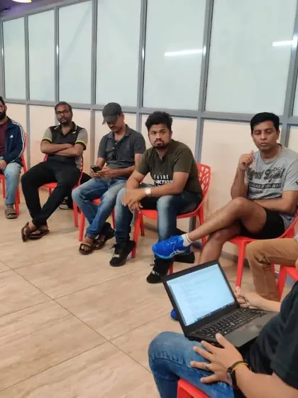 Another angle from the managers' meeting, showing the focused discussion around event logistics. My goal is to anticipate and solve any issues before the first game is even played.