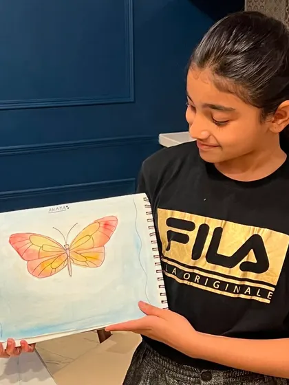 Look at this stunning watercolor butterfly! In our weekday sessions, we explore different subjects and techniques, like blending colors to create these beautiful, delicate wings.