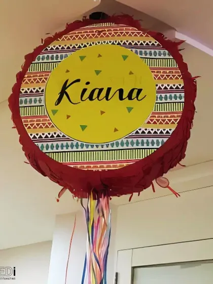 A custom-made piñata for Kiana's birthday. I can design piñatas to match any party theme, filled with candy and surprises for an explosive burst of fun.