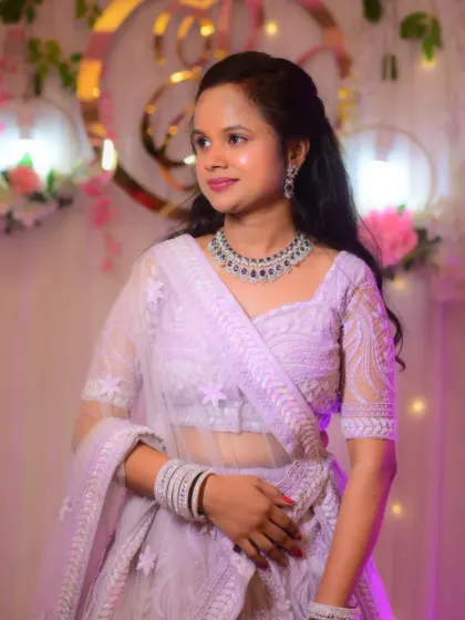 This bride chose different looks for her various wedding functions. We created a unique style for each event, from a traditional saree look to a modern lehenga style.