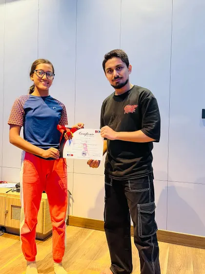 Students of all ages receiving their achievement certificates. My programs are structured to provide a clear path of progression for every dancer.