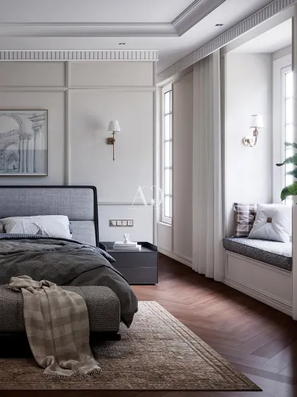 A closer view of the cozy window seat, a perfect nook for enjoying a book and the natural light. The design maximizes both comfort and the functionality of the space.