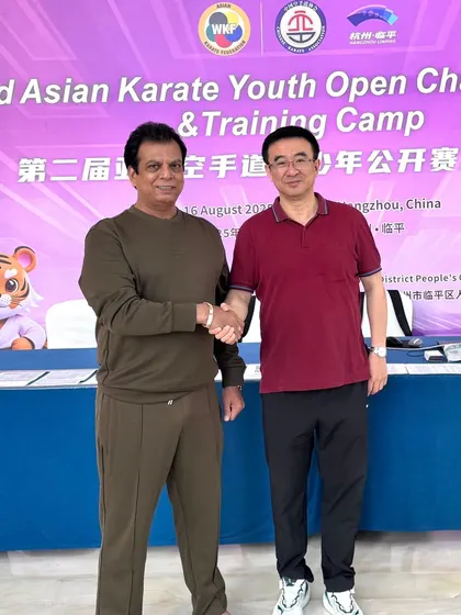 A handshake solidifying the strong relationship between the karate federations of India and China. International cooperation is essential for the growth of our sport.