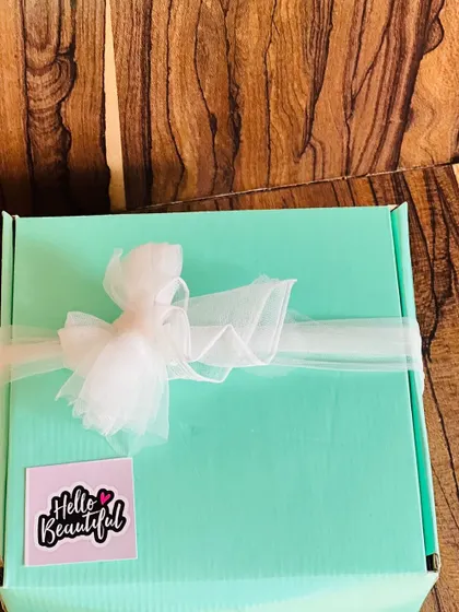 A simple and sweet farewell gift for a roommate, packaged in a mint green box with a 'Hello Beautiful' sticker.