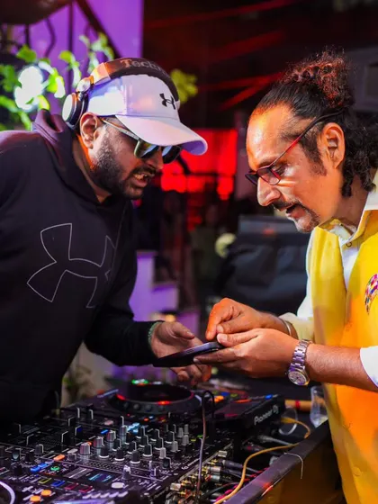 Taking a request or sharing a track with a guest at a private party. I'm always happy to connect with the crowd.