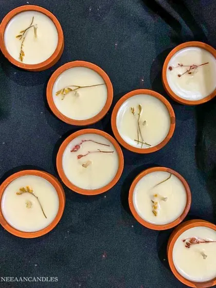 I call these my Mithai candles. Poured into little earthen pots and topped with dried flowers, they have a rustic, desi charm perfect for any Indian festival.