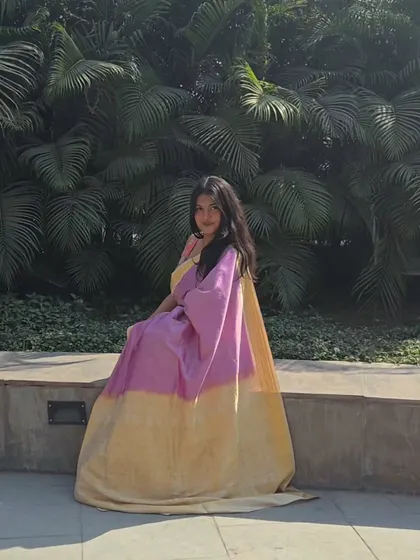 This pose shows the full length and beautiful fall of the Kanjivaram silk. Styling is also about finding the perfect photo opportunities to capture the essence of your outfit.