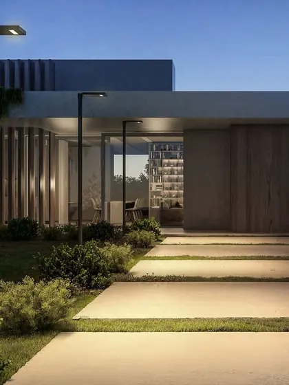 For this modern residence, we used our sleek solar lamp posts to illuminate the main pathway. These fixtures provide essential safety and guidance while complementing the home's clean lines and minimalist landscaping.