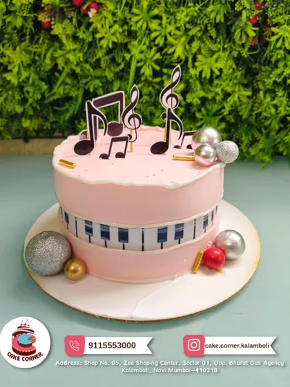 A symphony of sweetness! This music-themed cake with a piano keyboard and musical notes is perfect for a musician or music lover.