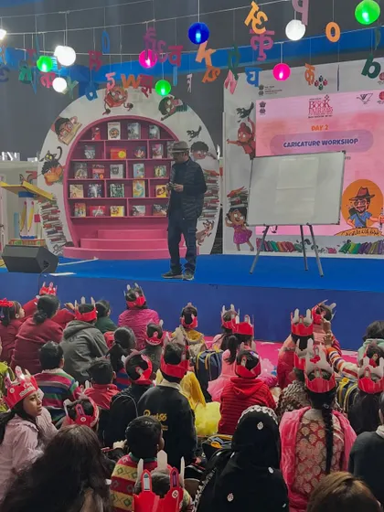 Addressing the students at the World Book Fair. It was inspiring to see them explore the art of caricature and experiment with expressions.